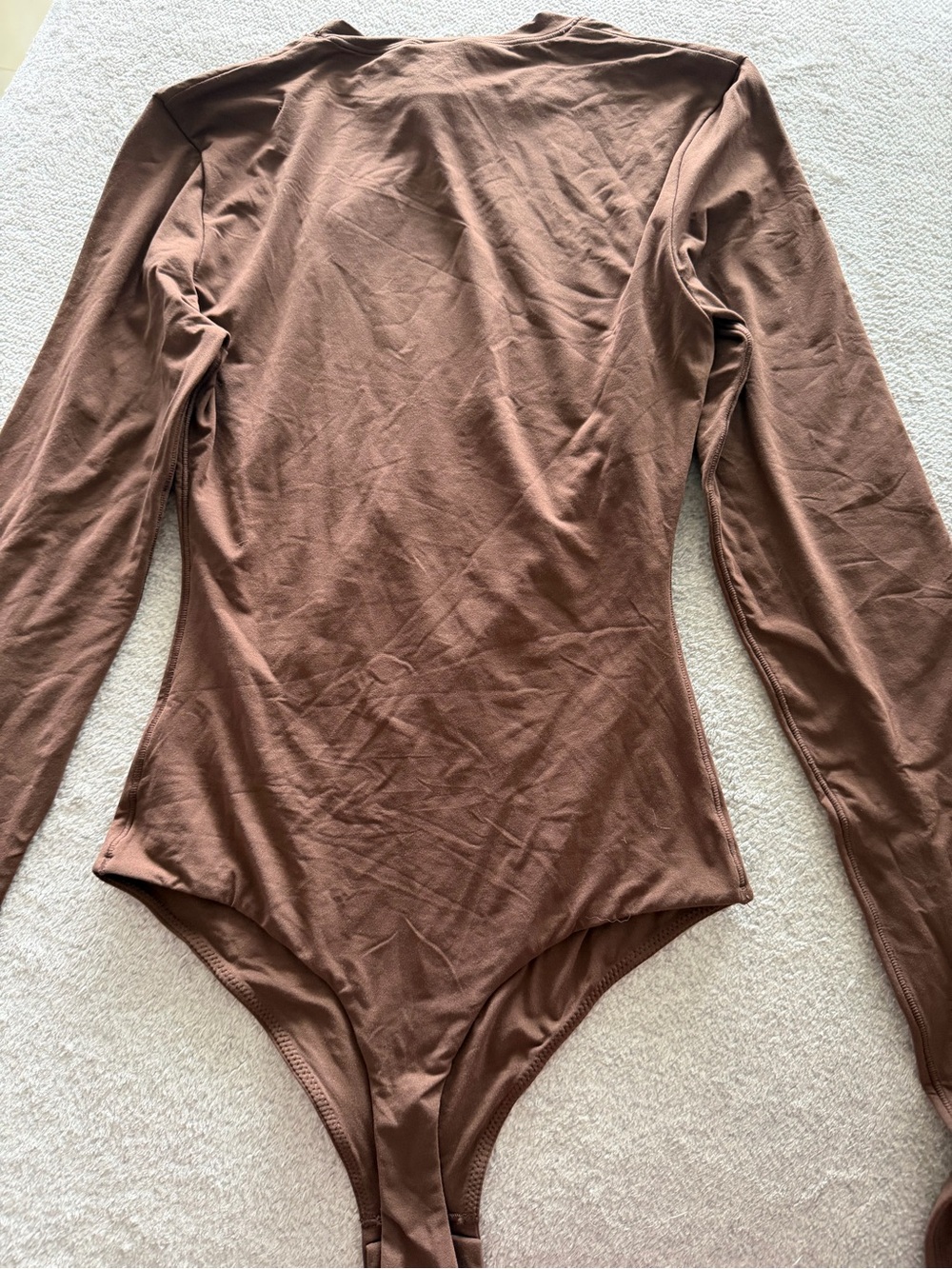 SKIMS Long-Sleeve One-Piece in Chocolate Brown